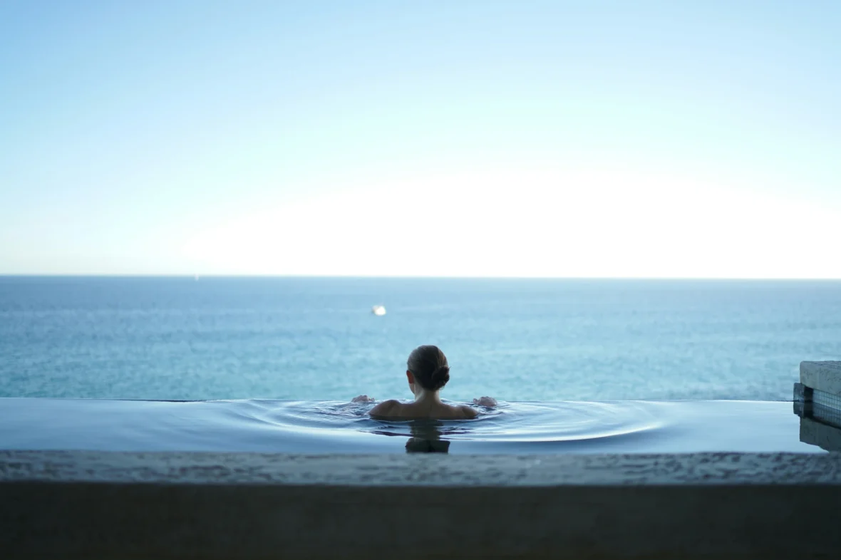 man in an infinity pool