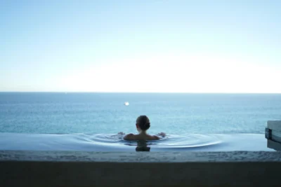 man in an infinity pool