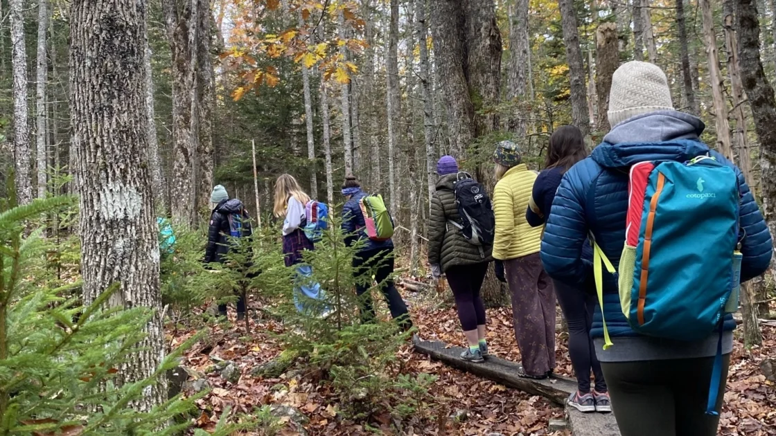 a group of young hikers in Acadia National Park