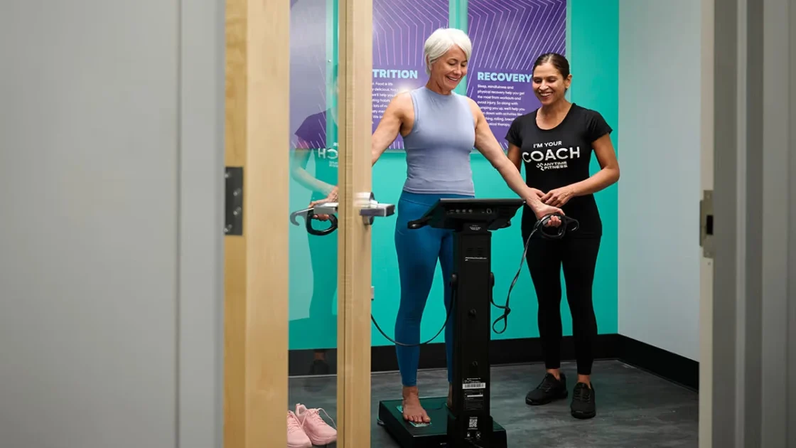 woman does a body scan at Anytime Fitness