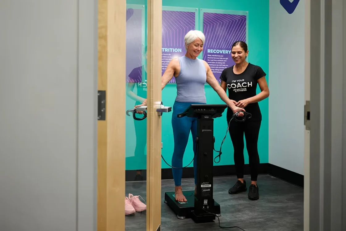 woman does a body scan at Anytime Fitness
