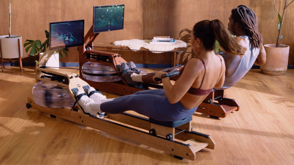 woman on an Ergatta rower