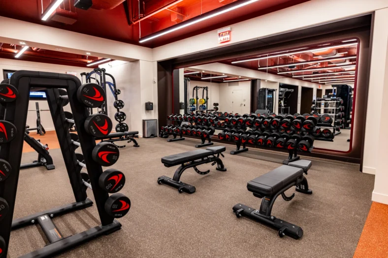 free weight area inside the gym at the Five Iron Golf Club