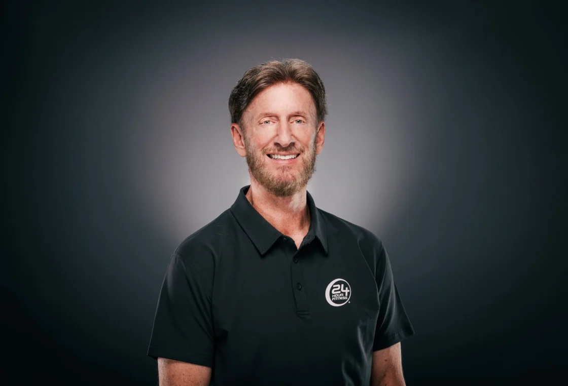 Mark Mastrov in a 24 Hour Fitness shirt