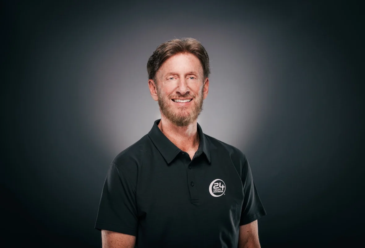 Mark Mastrov in a 24 Hour Fitness shirt