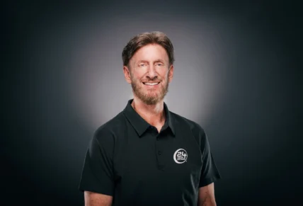 Mark Mastrov in a 24 Hour Fitness shirt