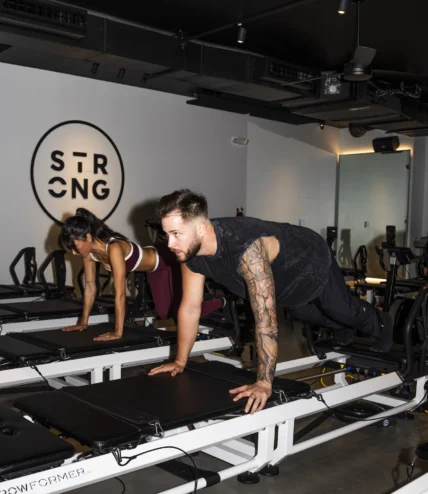 people work out inside Strong Pilates' West Hollywood studio