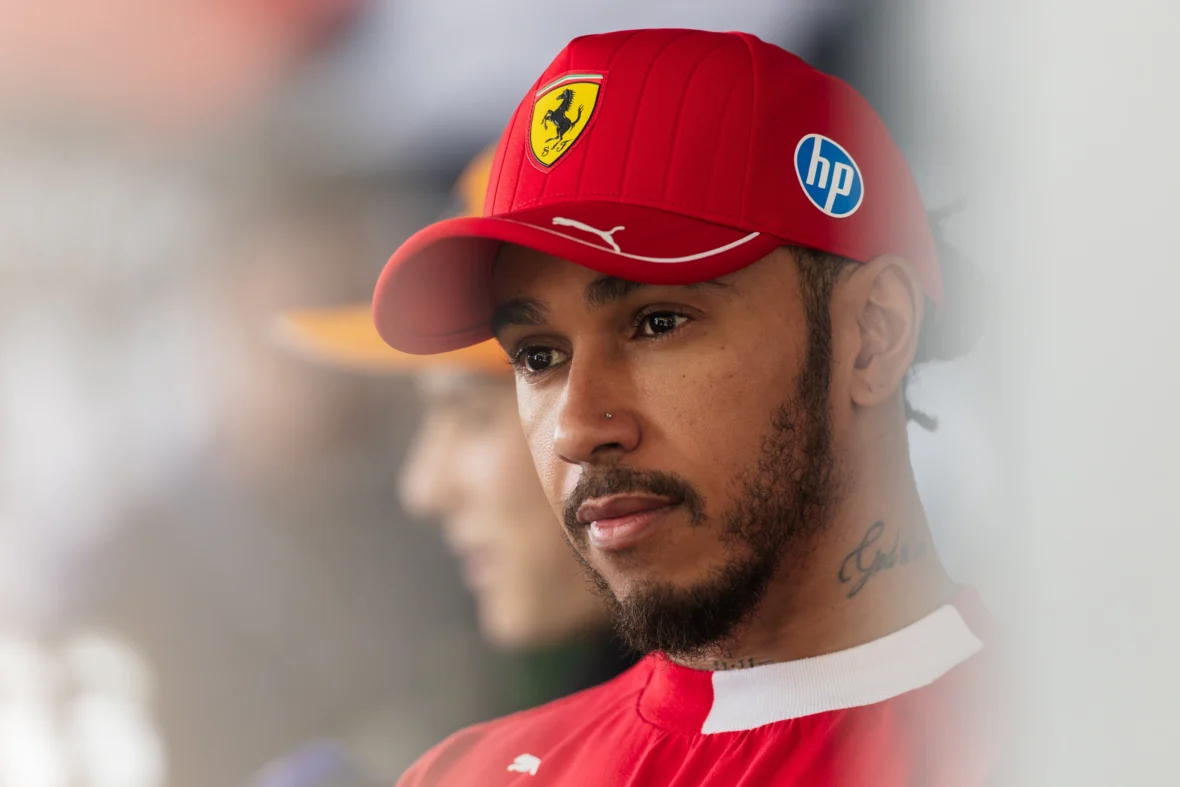 Lewis Hamilton wearing a Ferrari hat