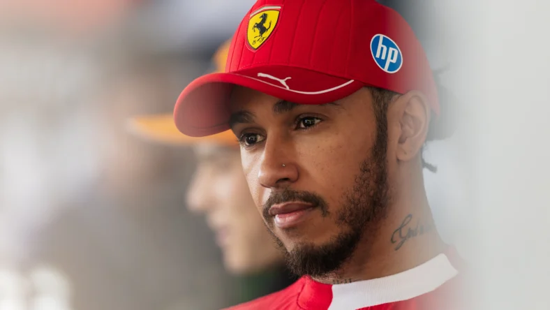 Lewis Hamilton wearing a Ferrari hat
