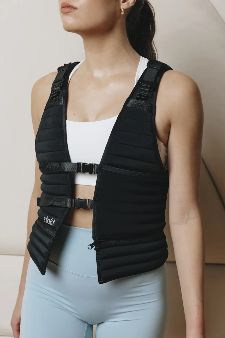 woman wears a Stakt weighted vest