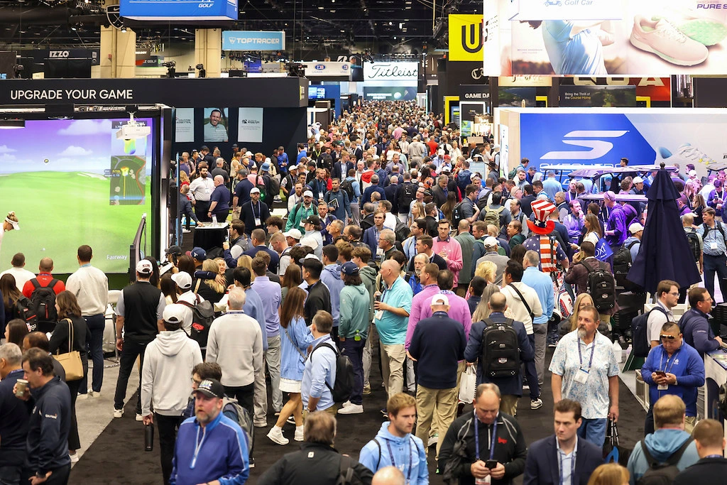 attendees walk the trade show floor at the PGA Show 2026