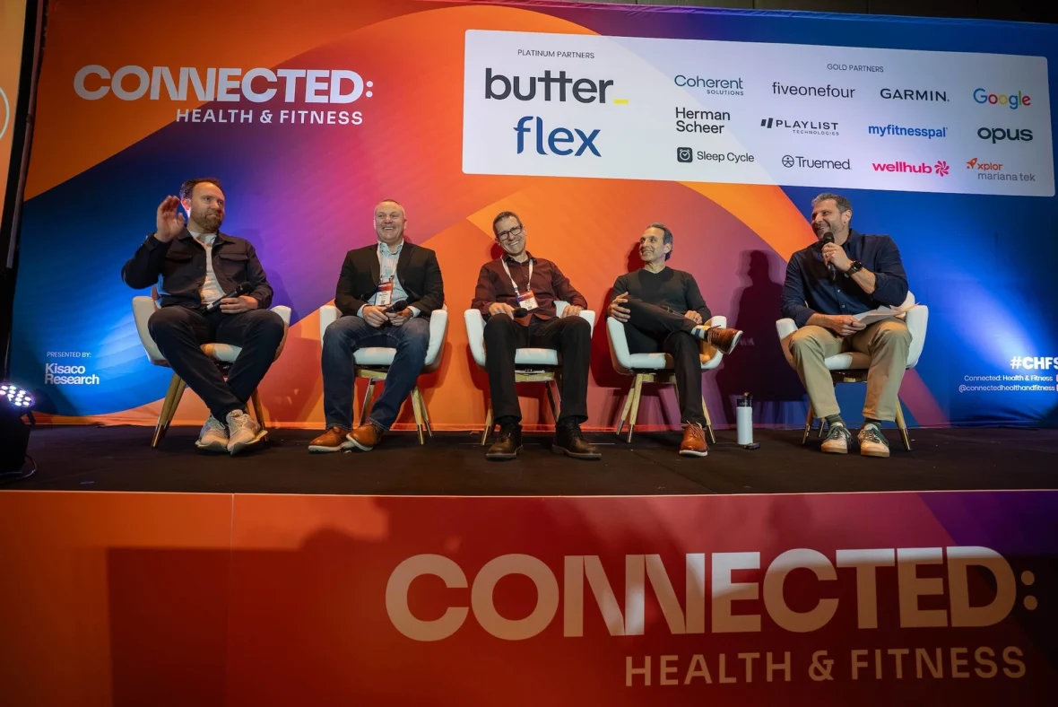 male panelists speak at the Connected: Health and Fitness Summit