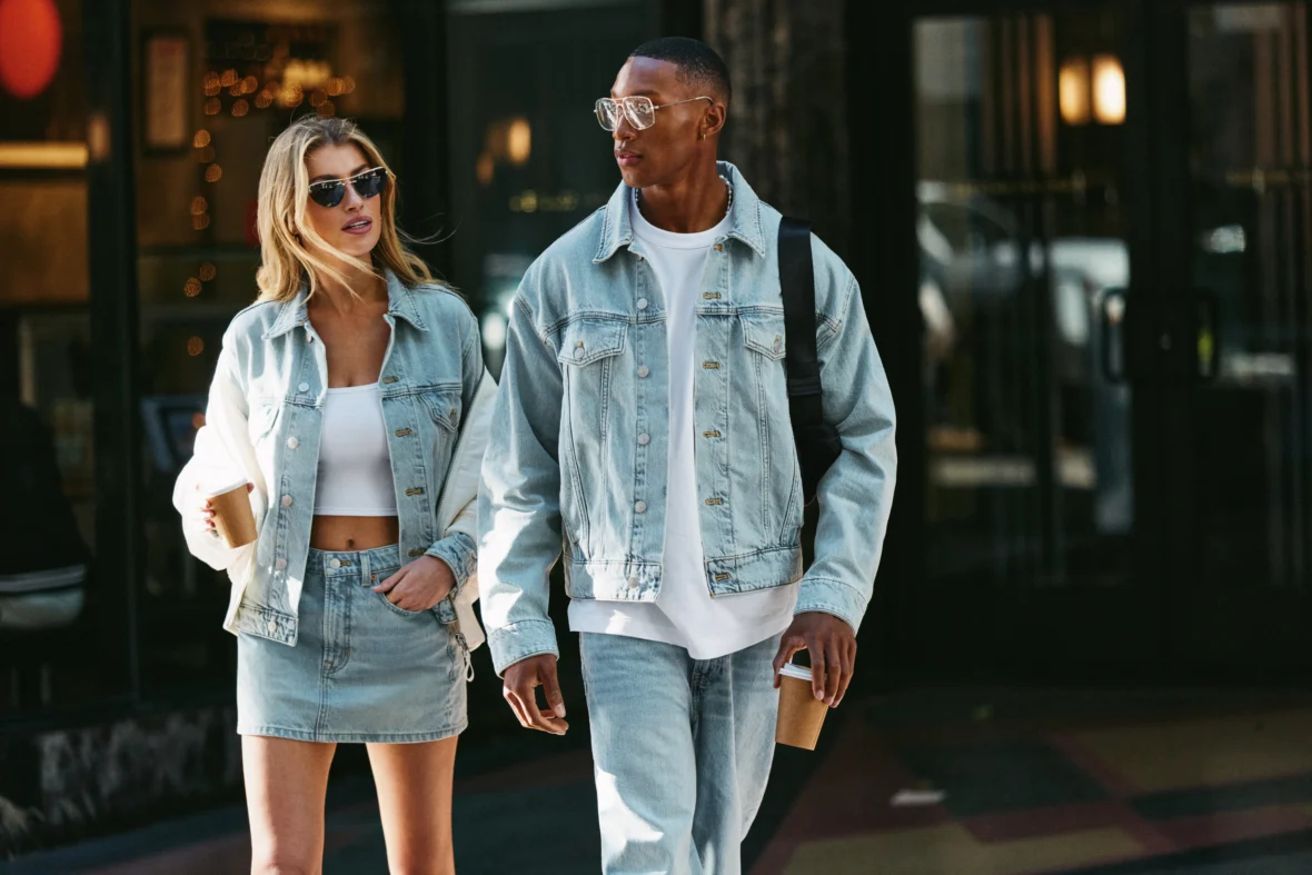 man and woman in Fabletics denim