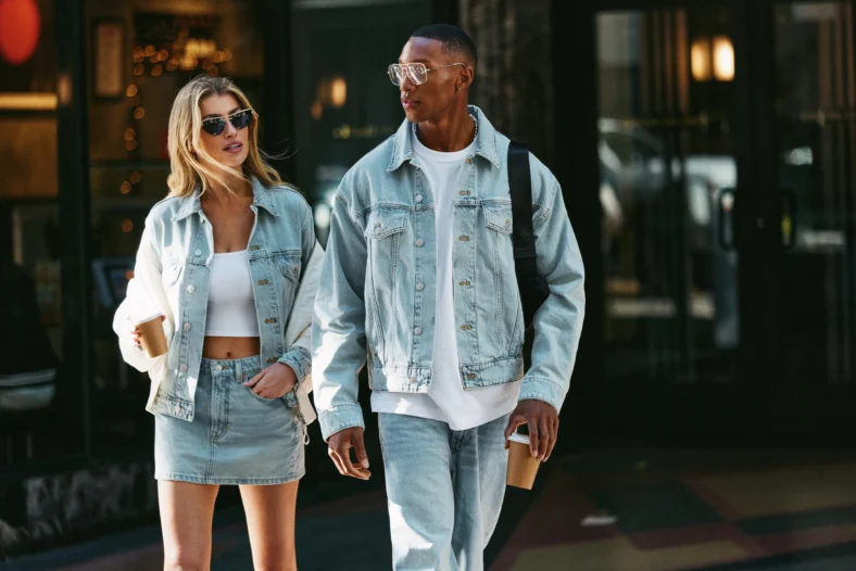 man and woman in Fabletics denim