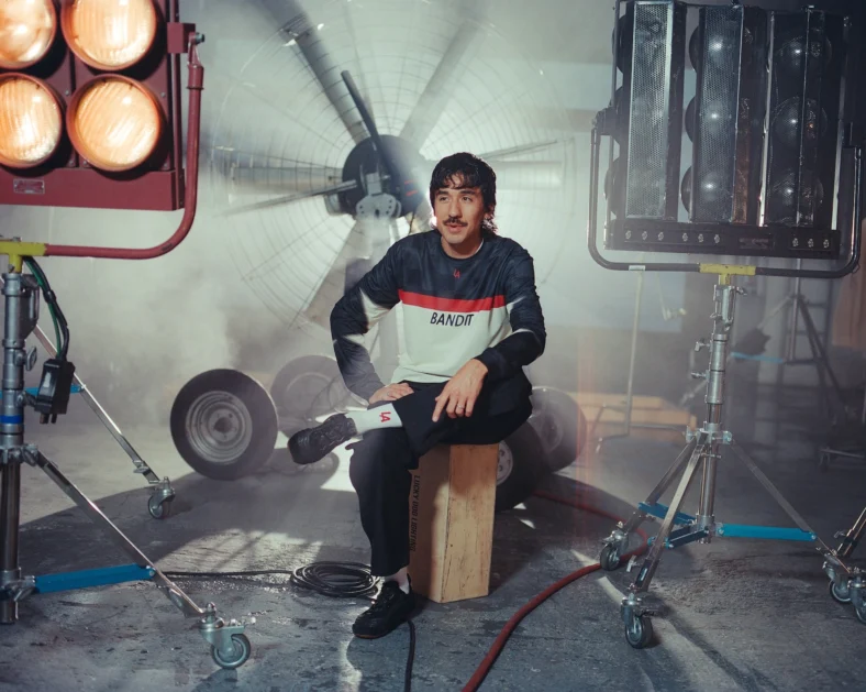 man poses in Bandit gear for an LA Marathon promo