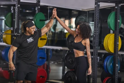 people work out inside a New York Sports Club