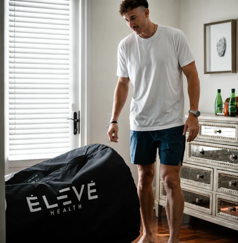 Gordon Hayward next to an Élevé recovery device