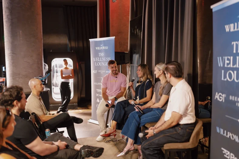 people speak on a wellness industry panel