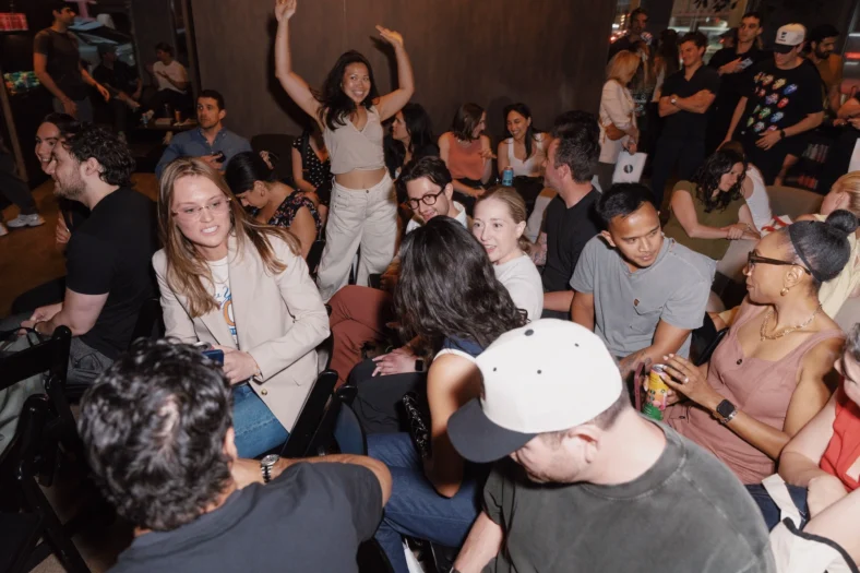 people gather for a wellness industry event