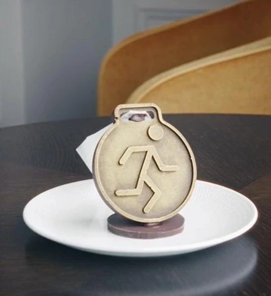 dessert in the shape of a marathon medal