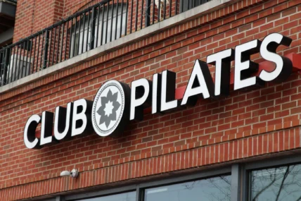 Club Pilates sign on a storefront
