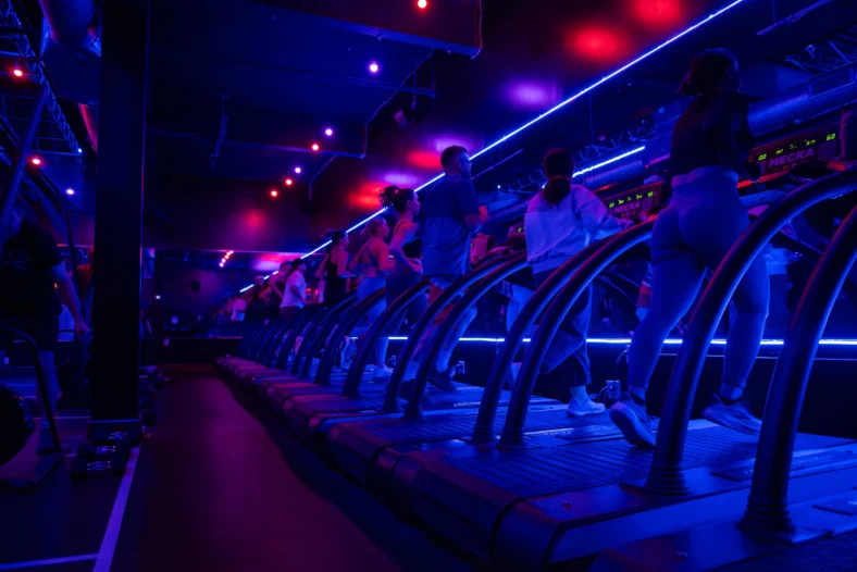 people on treadmills at a Mecka Fitness