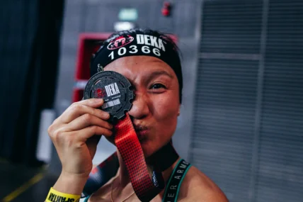 woman with a medal from a fitness competition