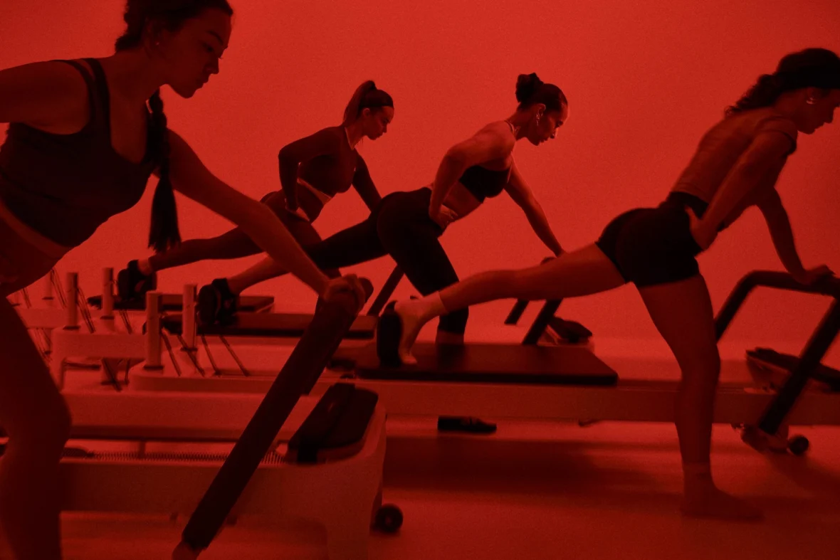 people take a Les Mills reformer Pilates class