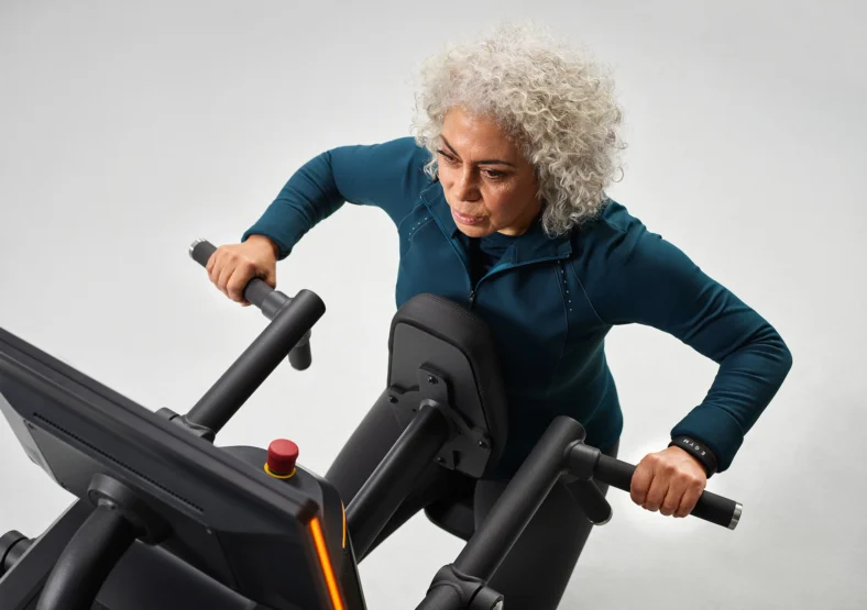 woman on an EGYM machine