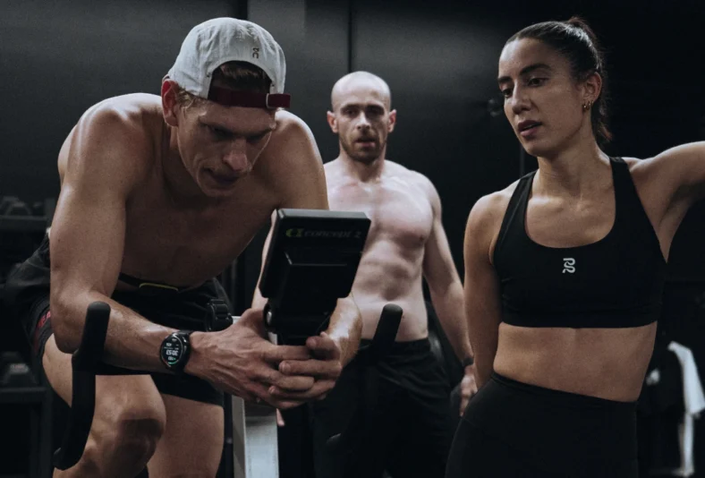 man and woman work out inside a Revl Training