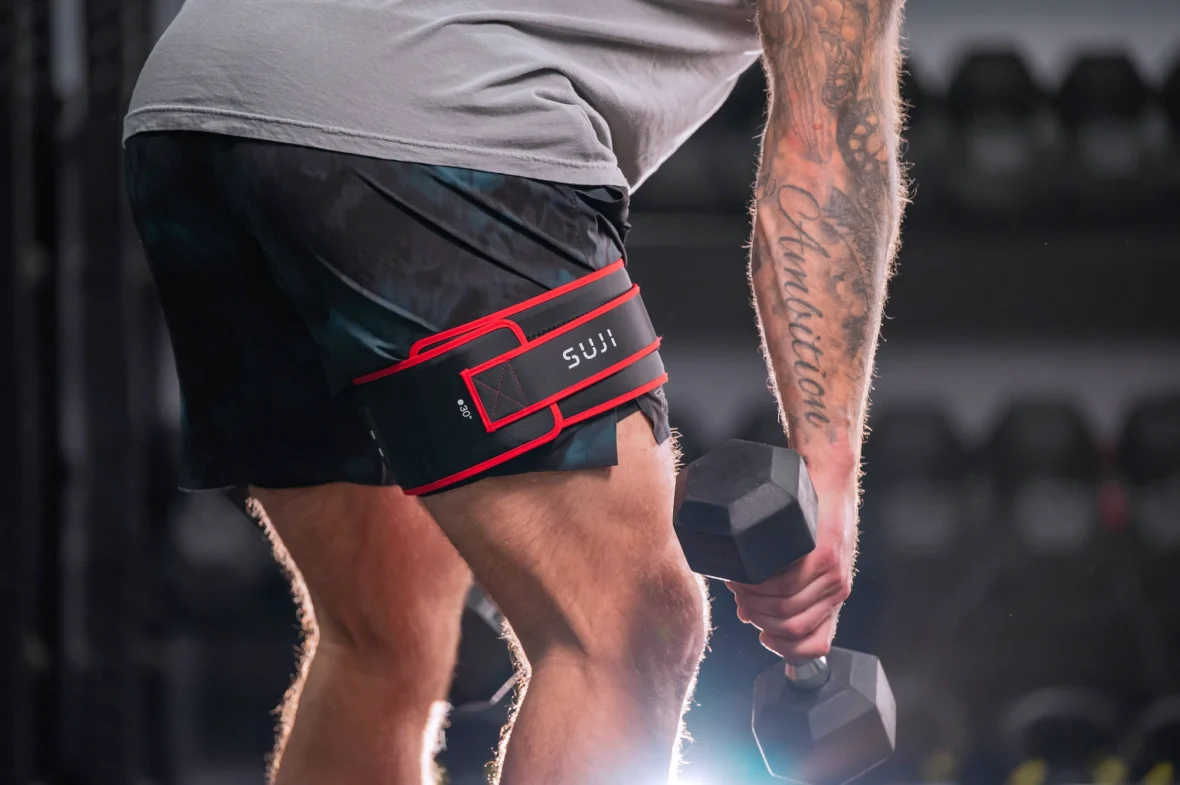 Man wears a Suji wearable
