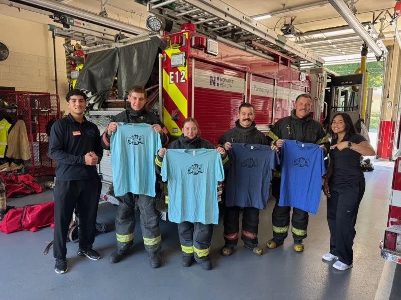 firefighters wear Crunch Fitness t shirts