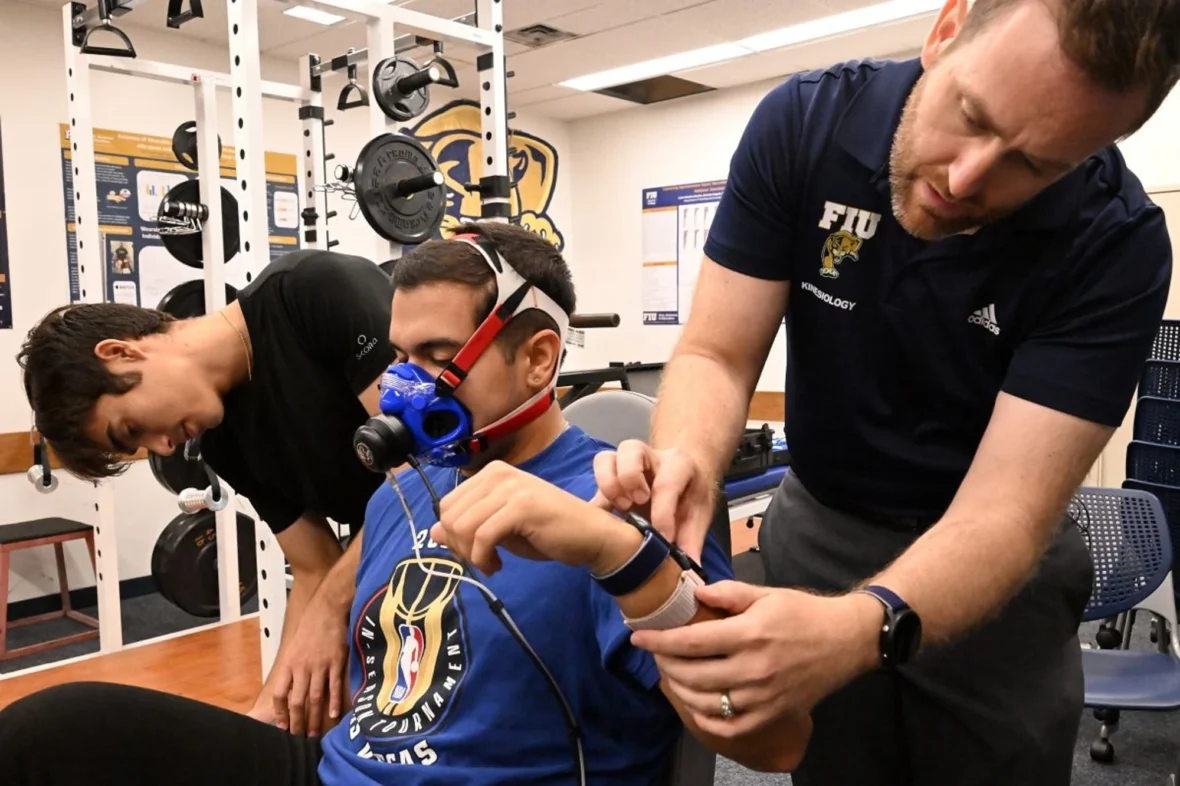 man uses lab equipment to track calories burned
