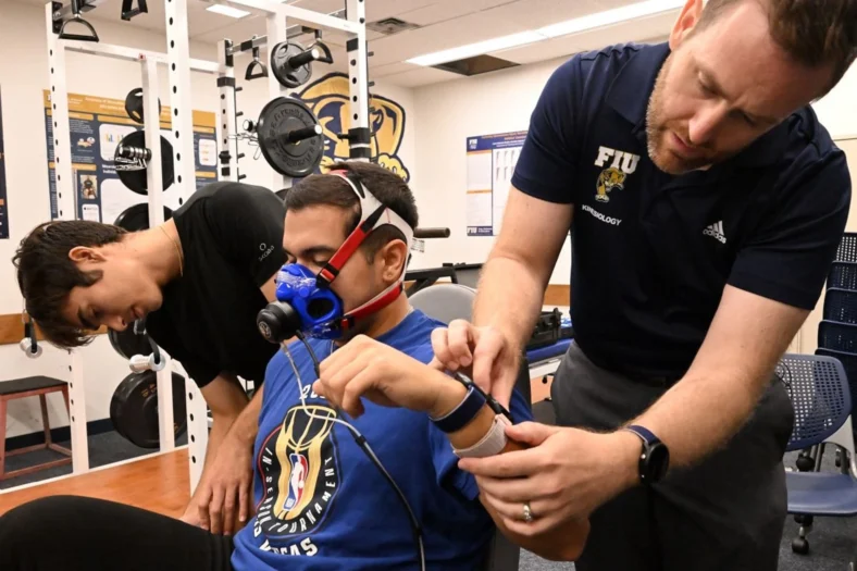 man uses lab equipment to track calories burned