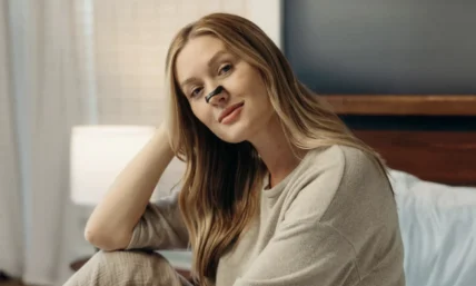 woman wearing Intake Breathing nasal strip
